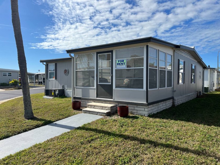 This tastefully furnished home offers new ice-cold A/C, a brand - Beach Home for sale in Largo, Florida on Beachhouse.com