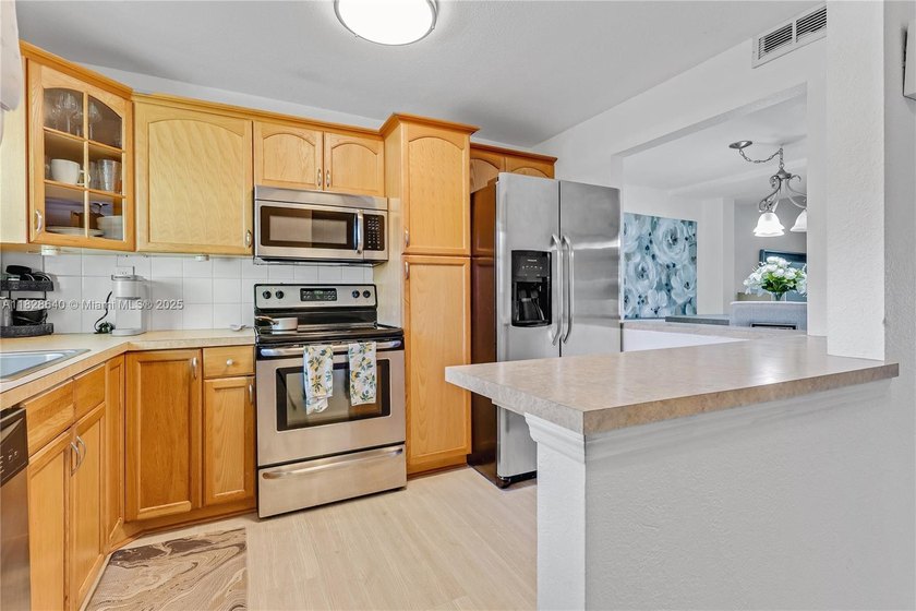 Welcome home to this beautifully updated townhouse, filled with - Beach Condo for sale in Pembroke Pines, Florida on Beachhouse.com