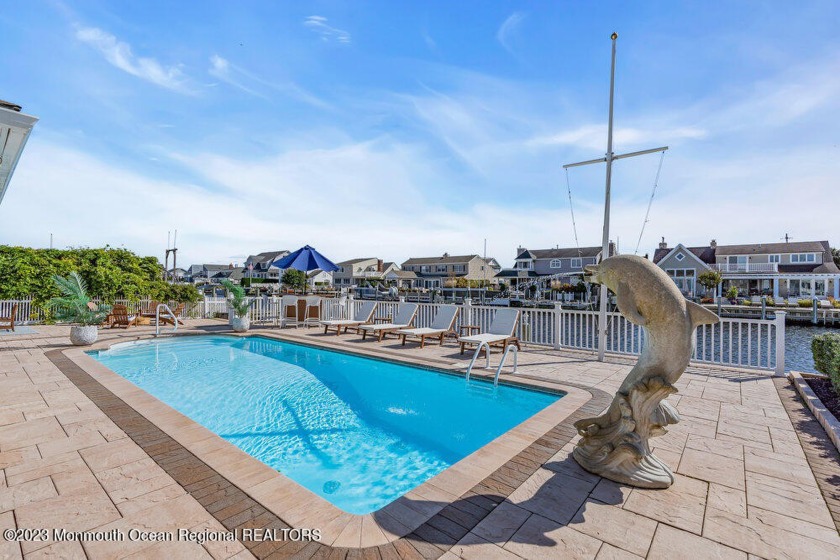 The backyard oasis features 75 feet of waterfront, a heated - Beach Home for sale in Mantoloking, New Jersey on Beachhouse.com