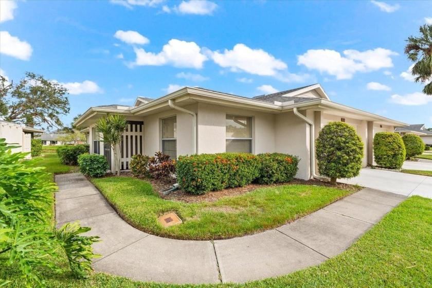 Welcome to this peaceful, move-in ready villa in the desirable - Beach Home for sale in Sarasota, Florida on Beachhouse.com