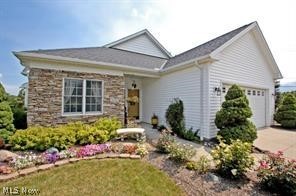 Experience maintenance-free living at its finest in this - Beach Home for sale in Avon, Ohio on Beachhouse.com