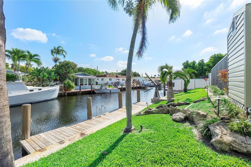 As you enter this impeccably maintained, lusciously landscaped - Beach Home for sale in Dania  Beach, Florida on Beachhouse.com