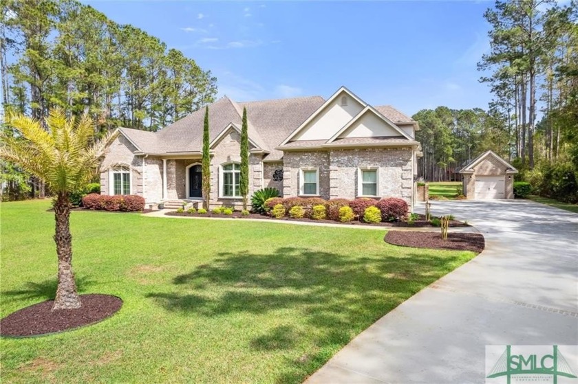 Nestled within The Bluffs gated community, this home offers an - Beach Home for sale in Richmond Hill, Georgia on Beachhouse.com