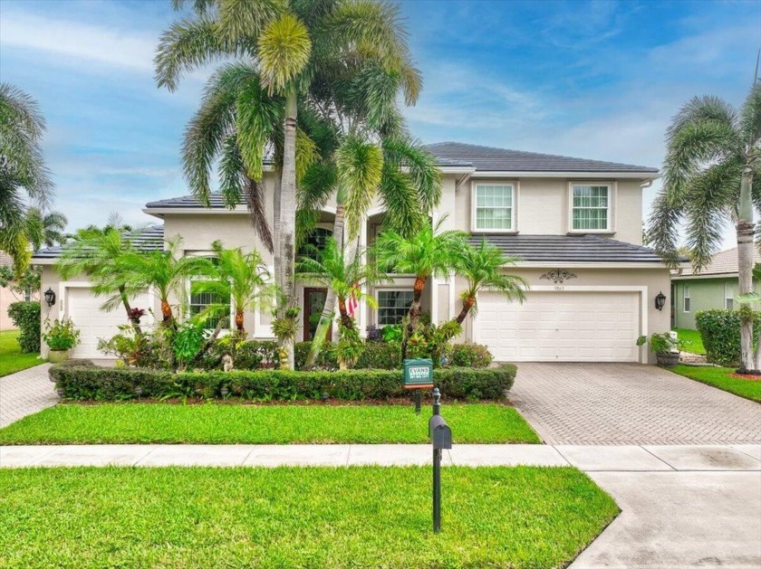 This gorgeous lakefront estate home within the gated community - Beach Home for sale in West Palm Beach, Florida on Beachhouse.com