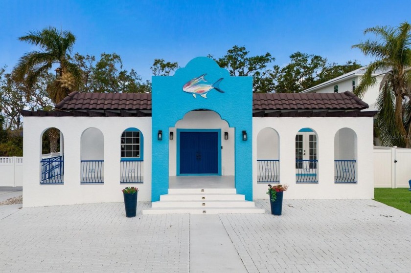 This beautifully updated 3-bedroom, 4.5-bath home is an ideal - Beach Home for sale in Sarasota, Florida on Beachhouse.com