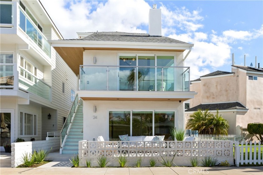 This stunning custom home seamlessly blends Contemporary Coastal - Beach Home for sale in Long Beach, California on Beachhouse.com
