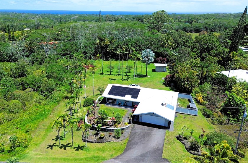 Beautifully upgraded 3-bedroom, 2.5-bath home situated on a full - Beach Home for sale in Keaau, Hawaii on Beachhouse.com