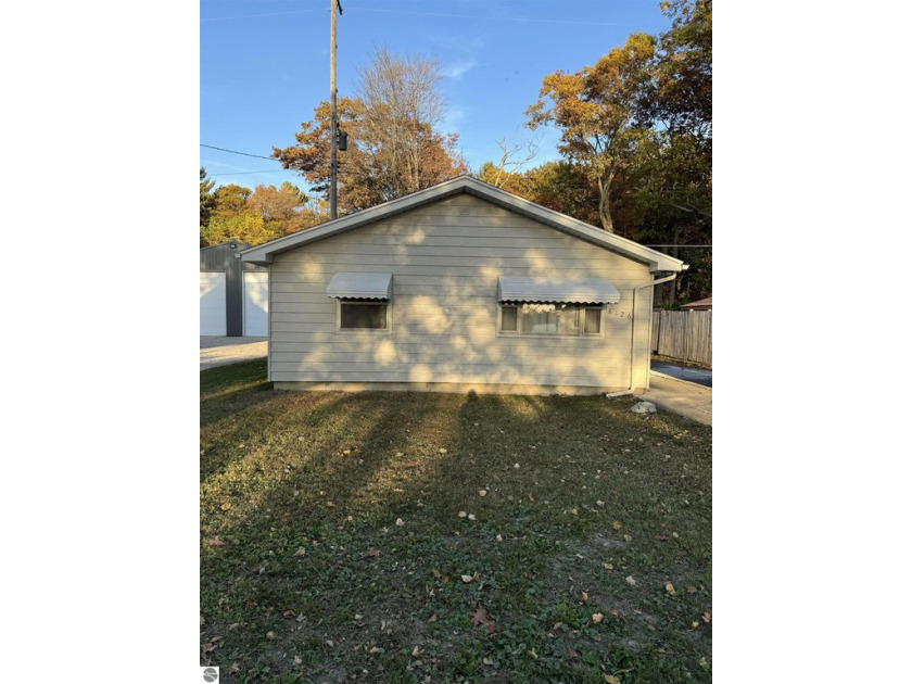 Quaint private setting, low maintenance, convenient location - Beach Home for sale in Oscoda, Michigan on Beachhouse.com