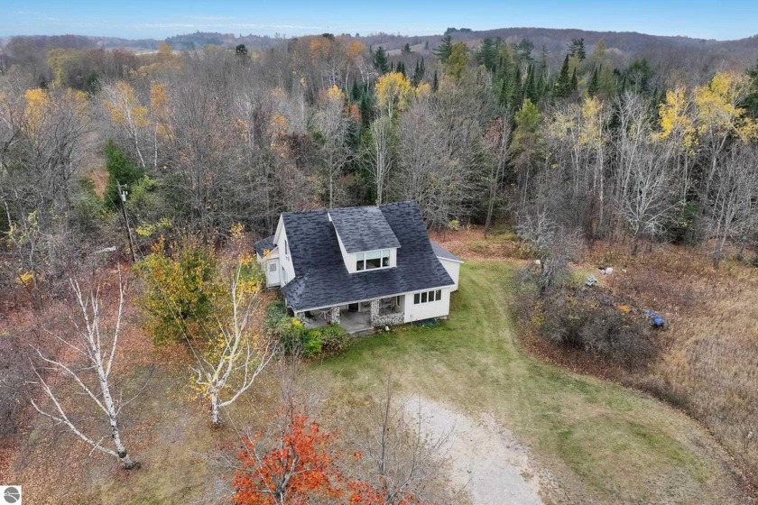 Charming 1930s Farmhouse on 5 Acres with Creek Frontage - - Beach Home for sale in Northport, Michigan on Beachhouse.com