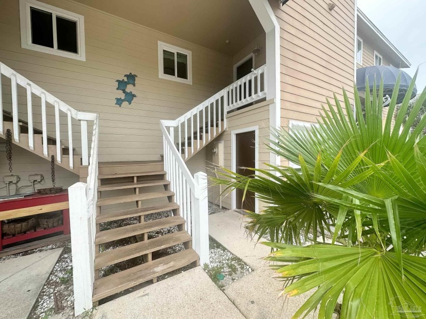 Waterfront Townhome with deep water boat slip on Little Sabine - Beach Home for sale in Pensacola Beach, Florida on Beachhouse.com