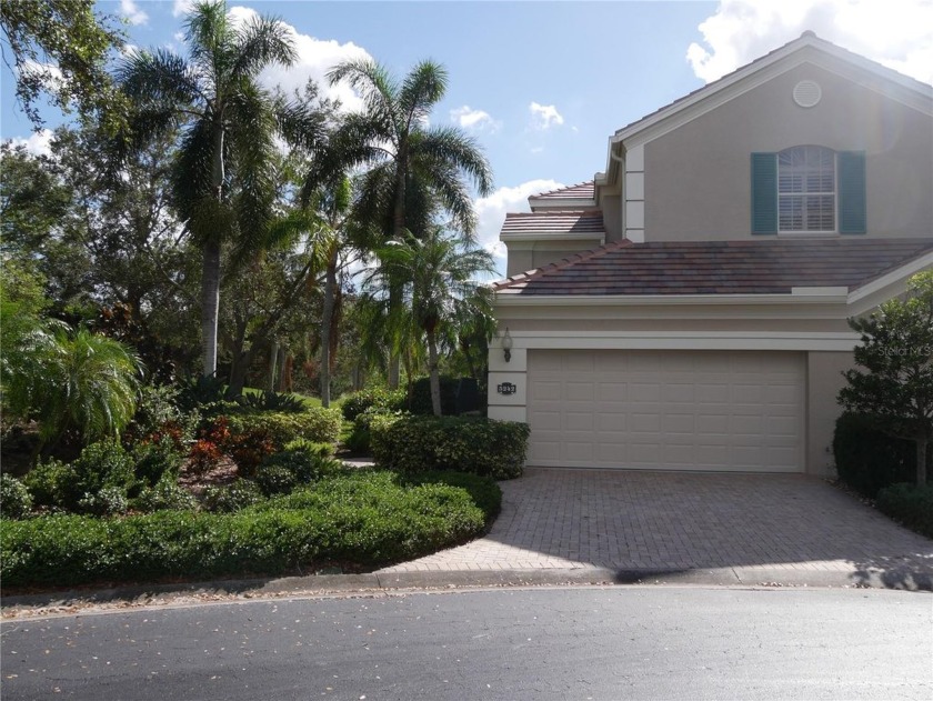 This STUNNINGLY RENOVATED, LAKEFRONT, second floor, end unit in - Beach Condo for sale in Sarasota, Florida on Beachhouse.com