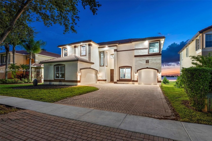 This stunning two-story waterfront home is located in the Resort - Beach Home for sale in Miramar, Florida on Beachhouse.com