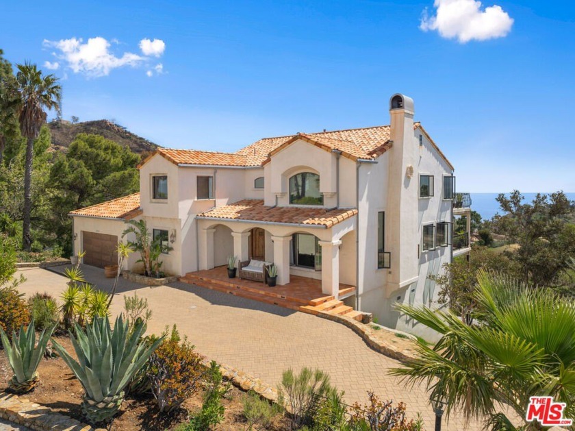 Nestled behind the gates of West Saddle Peak, this stunning - Beach Home for sale in Malibu, California on Beachhouse.com