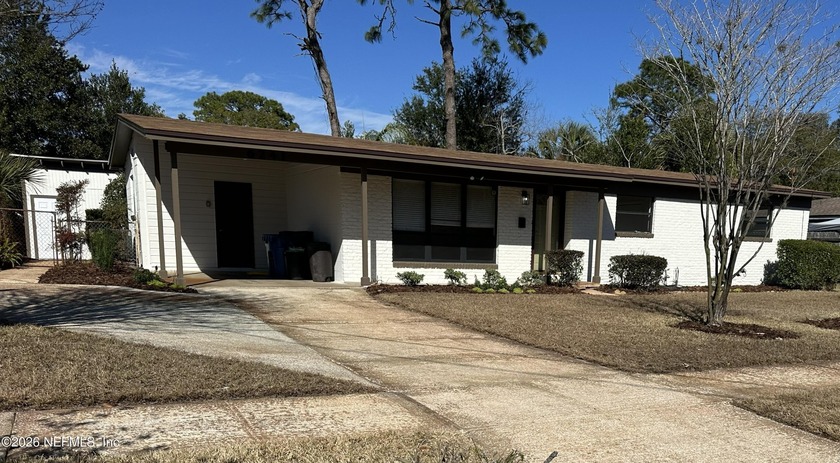 Nestled in the heart of Arlington on a spacious lot, this - Beach Home for sale in Jacksonville, Florida on Beachhouse.com