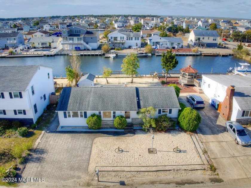 Waterfront Opportunity! Discover this charming 1,268 sq. ft - Beach Home for sale in Little Egg Harbor, New Jersey on Beachhouse.com