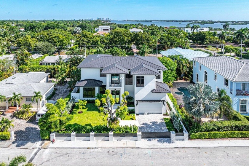 Modern elegance meets coastal charm at 109 Arlington Place in - Beach Home for sale in West Palm Beach, Florida on Beachhouse.com