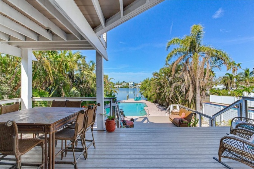 WATERFRONT ELEVATED COASTAL DREAM WITH OVERSIZED POOL - A BEACH - Beach Home for sale in Madeira Beach, Florida on Beachhouse.com