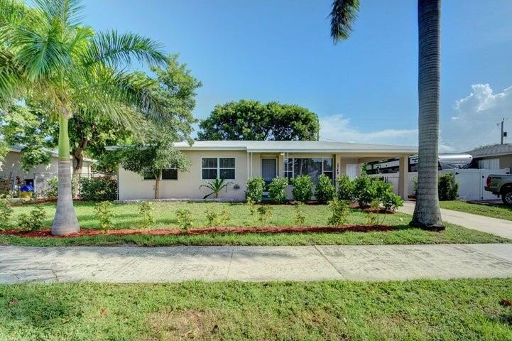 Rarely available 4 bed/2 bath home that is situated on one of - Beach Home for sale in Lake Worth Beach, Florida on Beachhouse.com