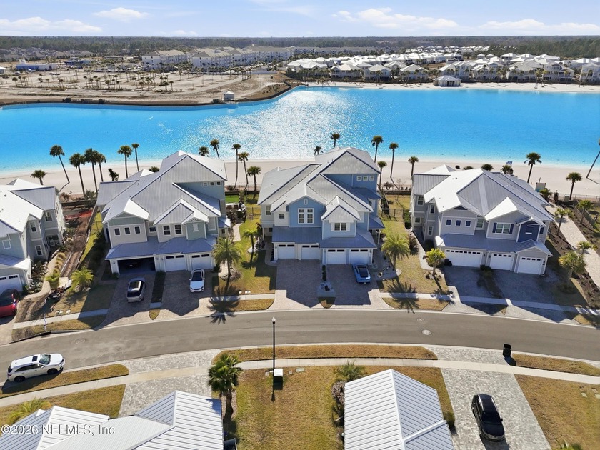 Walk right out your back door and feel the sand between your - Beach Condo for sale in Saint Johns, Florida on Beachhouse.com