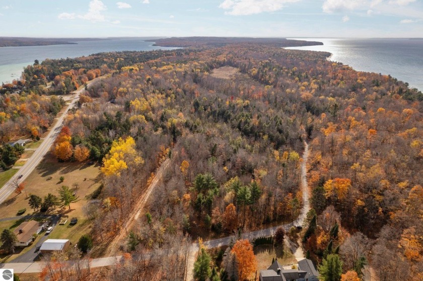 Discover 30+ wooded acres nestled in a highly sought-after - Beach Acreage for sale in Eastport, Michigan on Beachhouse.com