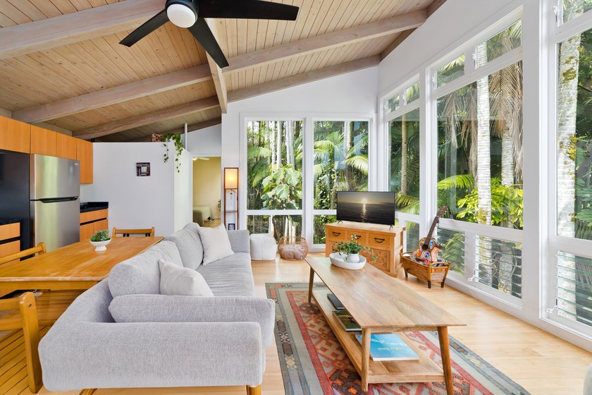 Perched in a lush rainforest, this turn key Hilo home boasts - Beach Home for sale in Hilo, Hawaii on Beachhouse.com