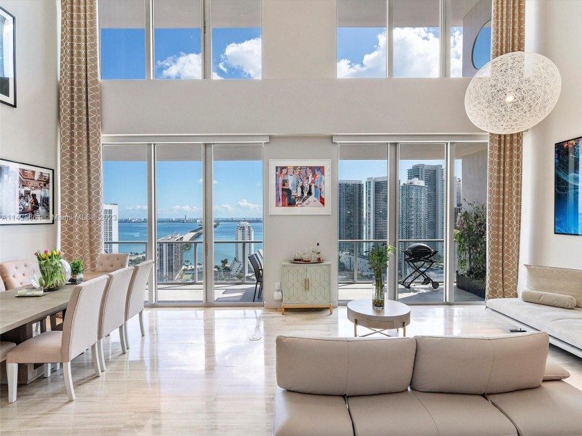 This luxurious penthouse offers breathtaking water views from - Beach Condo for sale in Miami, Florida on Beachhouse.com