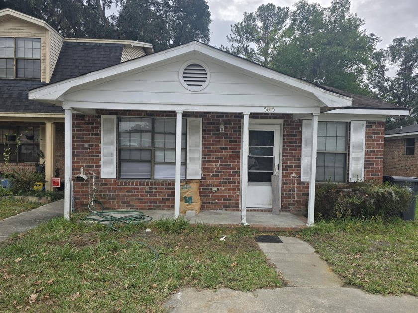 HANDYMAN SPECIAL!!  This 2br 2 ba single family attached home is - Beach Home for sale in North Charleston, South Carolina on Beachhouse.com