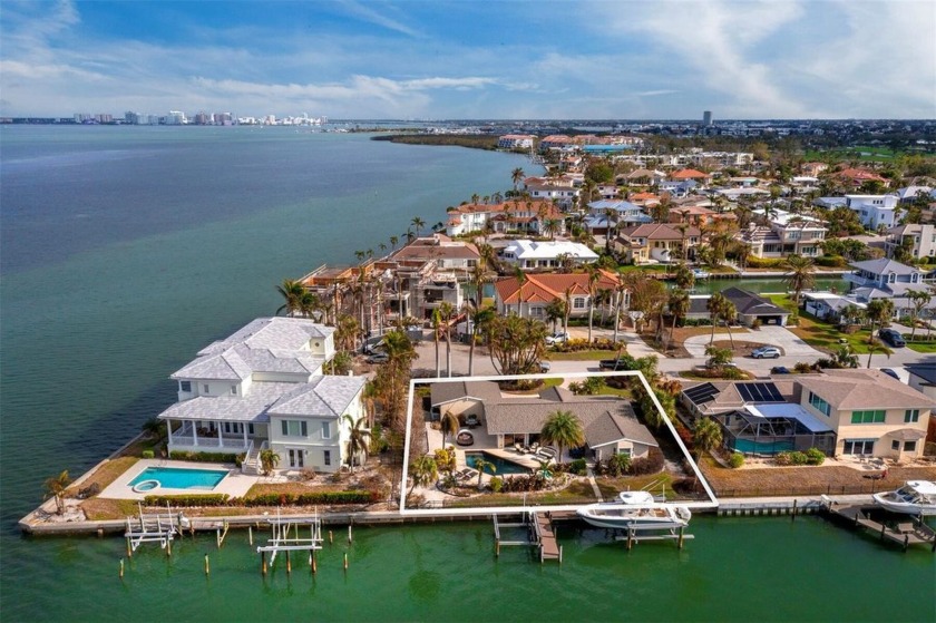 Located in the sought-after Country Club Shores community on the - Beach Home for sale in Longboat Key, Florida on Beachhouse.com