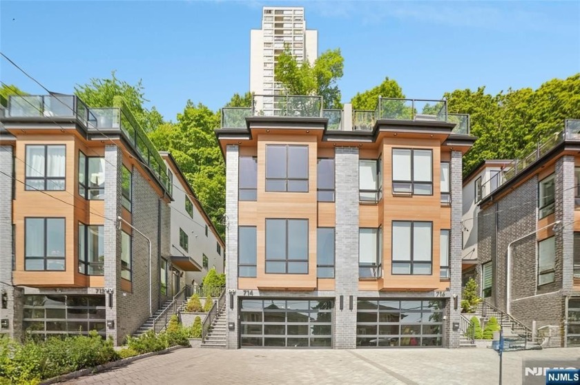 A NEWLY BUILT,STUNNING CONTEMPORARY LUXURY TOWNHOME SPANNING - Beach Home for sale in Edgewater, New Jersey on Beachhouse.com