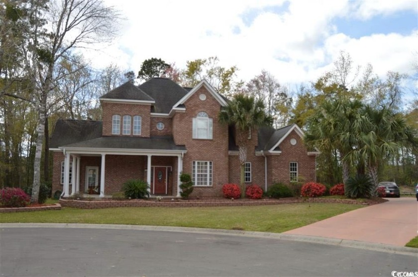 Welcome home to this all brick custom home in Brookhaven at - Beach Home for sale in Murrells Inlet, South Carolina on Beachhouse.com