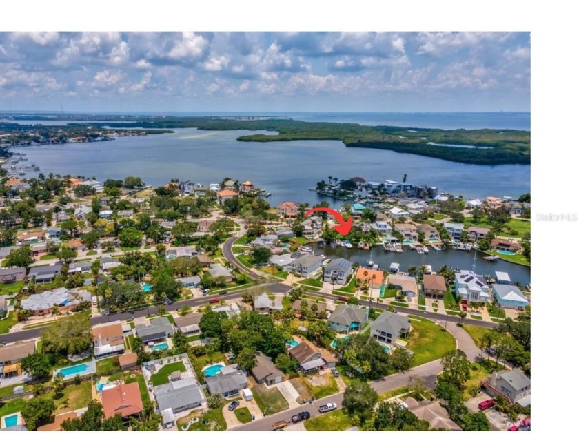 This impressive waterfront lot in Arrowhead Estates offers - Beach Lot for sale in St. Petersburg, Florida on Beachhouse.com