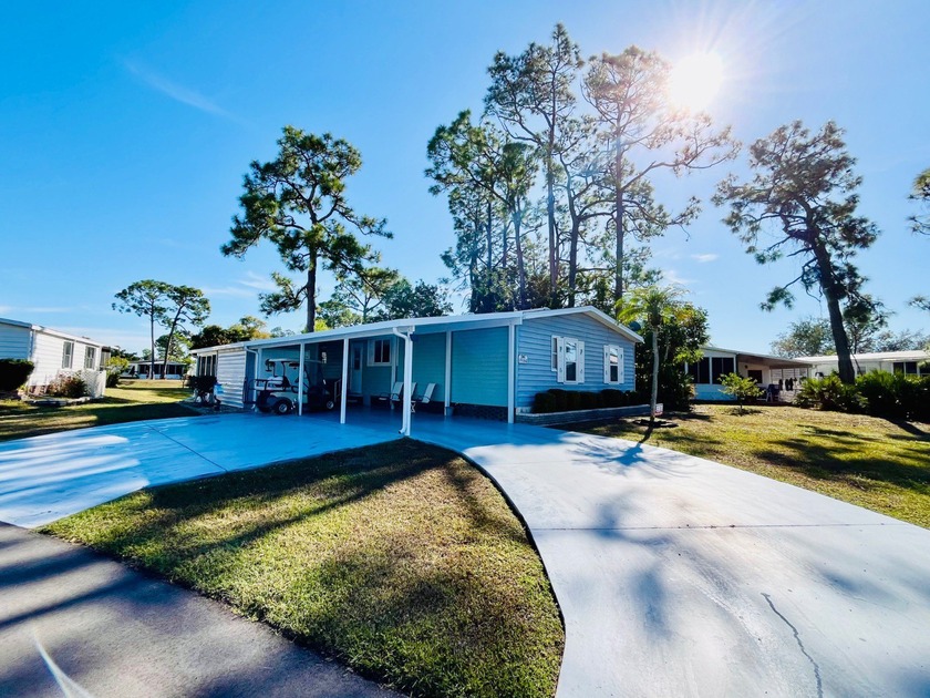 This beautifully maintained turnkey home is located in Lake - Beach Home for sale in North Fort Myers, Florida on Beachhouse.com