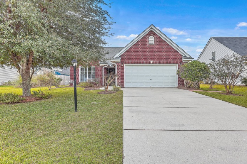 Charming one-and-a-half Story Home with Tranquil Pond View! This - Beach Home for sale in Charleston, South Carolina on Beachhouse.com