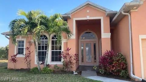 This 4 bedroom, 3 full bath house is nestled on the freshwater - Beach Home for sale in Cape Coral, Florida on Beachhouse.com