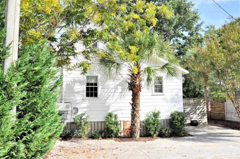 This charming duplex with private courtyards, originally the - Beach Home for sale in Mount Pleasant, South Carolina on Beachhouse.com