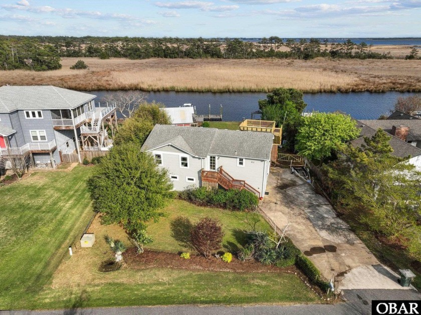 Imagine waking up to the tranquil views of your deep-water canal - Beach Home for sale in Kitty Hawk, North Carolina on Beachhouse.com