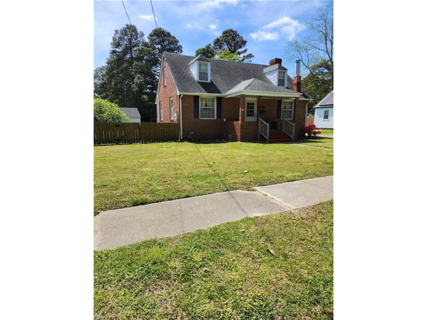 Welcome to this charming brick cape cod style home; perfectly - Beach Home for sale in Portsmouth, Virginia on Beachhouse.com