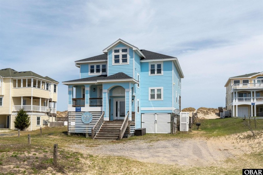 This stunning oceanfront retreat is situated on the oceanfront - Beach Home for sale in Corolla, North Carolina on Beachhouse.com