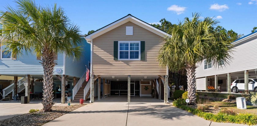 Set within the desirable natural gas community of Grande Harbour - Beach Home for sale in Little River, South Carolina on Beachhouse.com