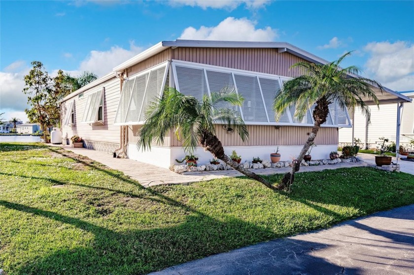 Bright and Spacious 2-Bedroom Manufactured Home with Lake View - Beach Home for sale in Osprey, Florida on Beachhouse.com