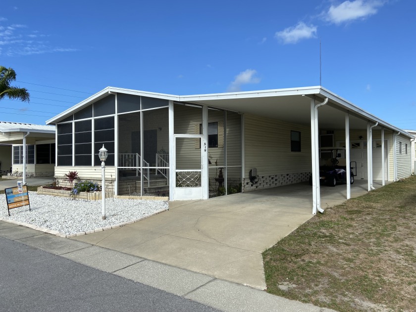 Located in 55+ Resort Style Community ** This stunning home - Beach Home for sale in Tarpon Springs, Florida on Beachhouse.com