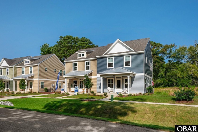 Just 15 minutes from the Wright Memorial Bridge, this appealing - Beach Home for sale in Jarvisburg, North Carolina on Beachhouse.com