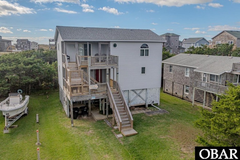 Tucked away on a quiet cul-de-sac just four lots back from the - Beach Home for sale in Frisco, North Carolina on Beachhouse.com