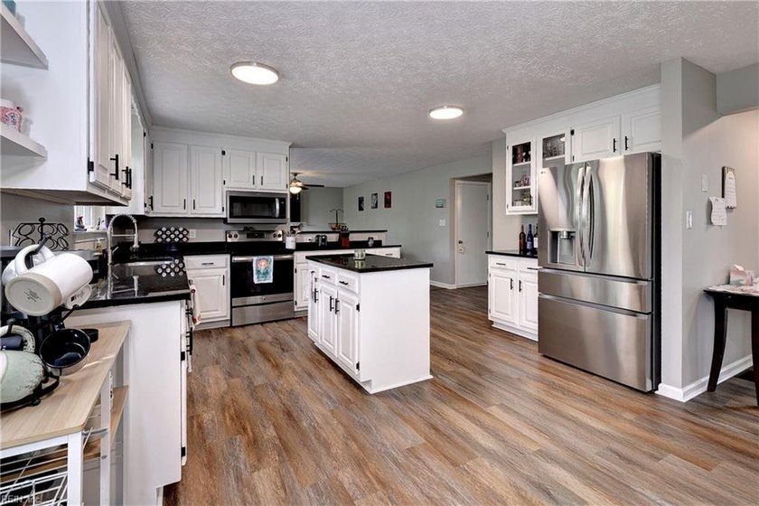 Recently renovated and thoughtfully refreshed, this residence - Beach Home for sale in Williamsburg, Virginia on Beachhouse.com