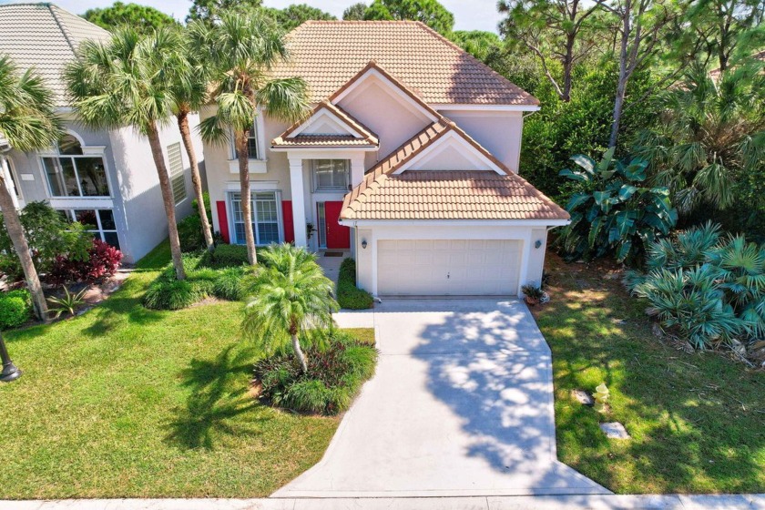 Well maintained 2 story Laurel model featuring a newer roof in - Beach Home for sale in Palm Beach Gardens, Florida on Beachhouse.com