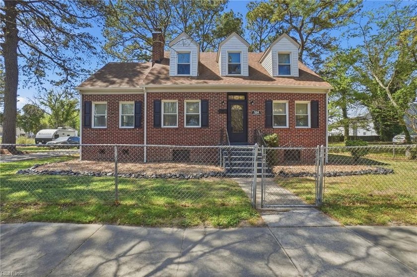Tucked along a tranquil street, this home delivers curb appeal - Beach Home for sale in Portsmouth, Virginia on Beachhouse.com