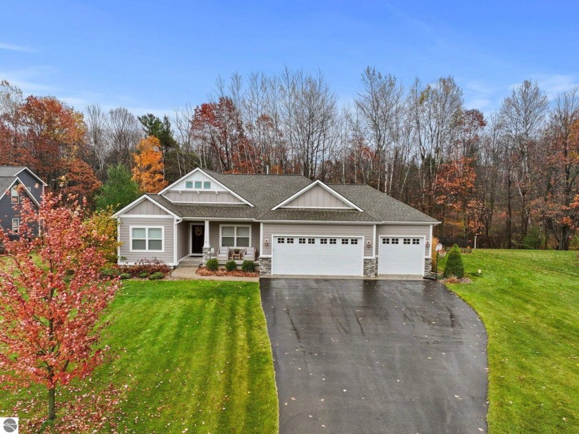 This exquisite 5-bedroom, 3-bathroom residence in Long Lake - Beach Home for sale in Traverse City, Michigan on Beachhouse.com