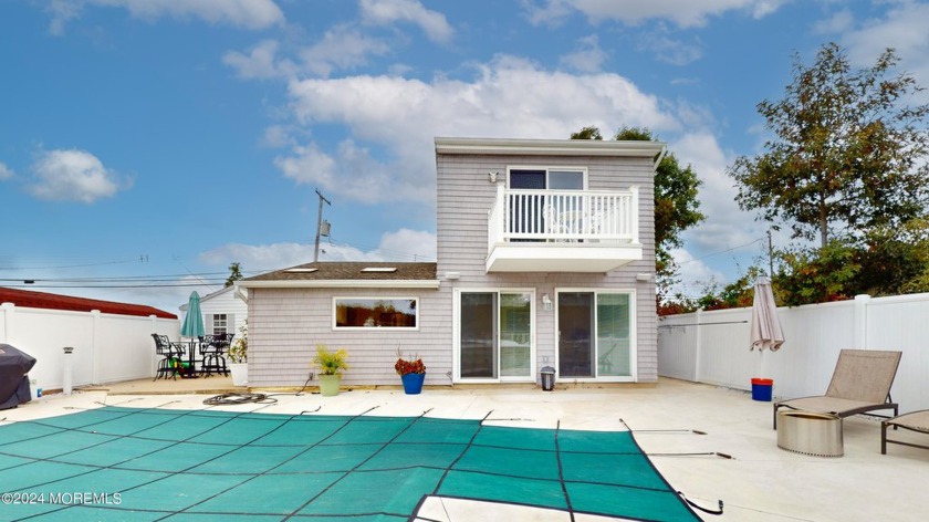 Super nice lagoon front home featuring 50 Feet waterfront and a - Beach Home for sale in Forked River, New Jersey on Beachhouse.com