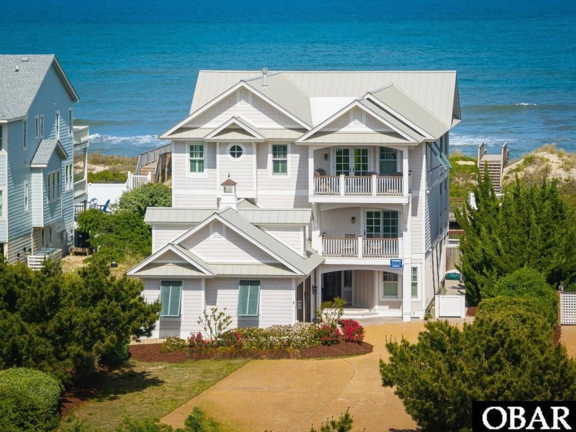 Discover the epitome of luxurious coastal living in the premier - Beach Home for sale in Corolla, North Carolina on Beachhouse.com