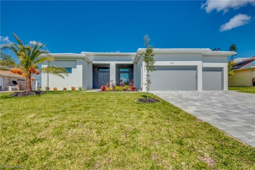 Check out this brand new custom LAKE HOUSE with heated pool and - Beach Home for sale in Cape Coral, Florida on Beachhouse.com